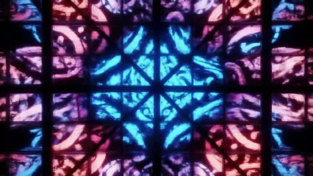 Abstract stained glass window with geometric patterns and vibrant colors creating a mesmerizing effect.