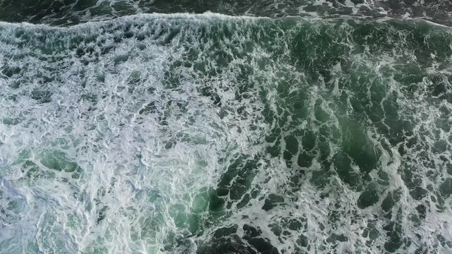 Aerial drone of the giant waves, foaming and splashing in the Ocean. Sri Lanka.