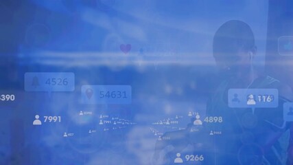 Animation of social media reactions over african american female runner checking smartwatch - Powered by Adobe