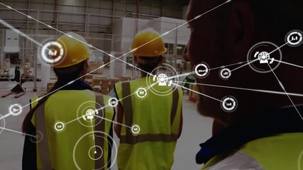 Animation of network of digital icons against team of workers walking together at warehouse - Powered by Adobe