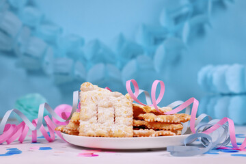Traditional fried Italian dessert snack for carnival season called 'Galani', ' Chiacchiere' or 'Crostoli' depending on region. Also known as Angel Wings pastry