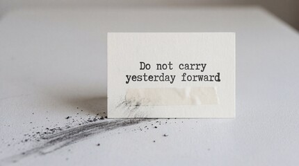 Minimalist card with inspiring quote about letting go of yesterday