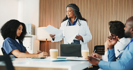 Doctors, meeting and woman with paperwork, hospital and collaboration for treatment plan and...