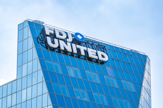 Boulogne-Billancourt, France - April 28, 2025: FDJ United logo on its headquarters, formerly Fran&ccedil;aise des Jeux group, the operator of France's and the Republic of Ireland's national lottery games.
