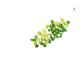 Freshly chopped vibrant green scallions in precise circular slices, julienned, and diced cuts, crisp, on a transparent background with copy space, flat lay, concept of fresh culinary ingredients