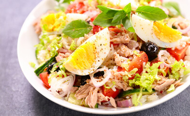 rice salad with egg, tomato, tuna, olive and basil