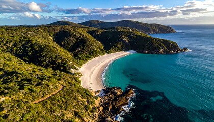 Scenic Coastal Landscape with Beach and Hills.