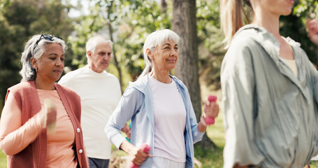 Dumbbell, health and class with old woman in park for learning, walking march and fitness club....