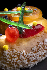 Close up of candied fruit  and sugar on a french epiphany brioche