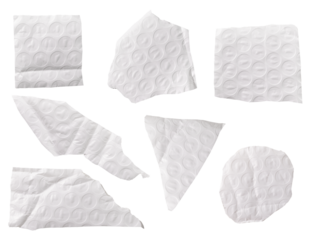 Set of torn white bubble wrap fragments with visible air pockets. Soft plastic texture, bubbly pack