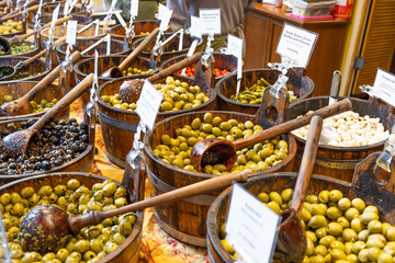 Fresh Assorted Olives in Wooden Barrels at Borough Market London