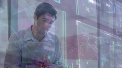 Animation of data processing over male doctor using tablet - Powered by Adobe