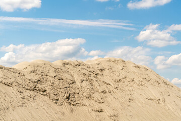 Stockpile of sand at construction site