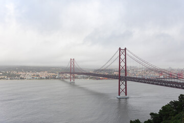 The 25 April bridge in cloudy weather