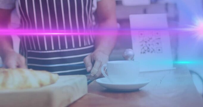 Barista showcasing croissant and coffee overlaying animated QR code and light flare for marketing