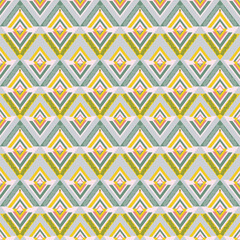 Yellow and green ethnic boho seamless pattern. Tribal pattern. Folk motif. Textile rapport. Ideas for tiles, pottery, textiles, backgrounds, blankets, and rugs.