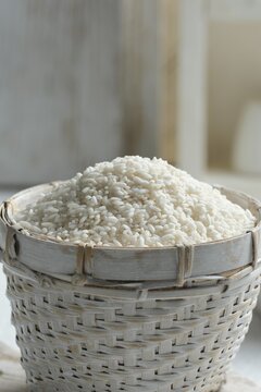 Close up beras organik or  organic rice in basket . Asian staple food