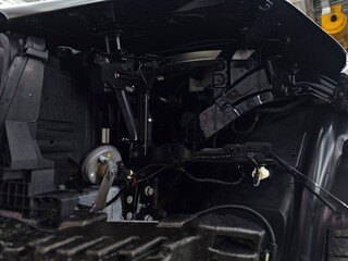 Car front frame showing engine bay components