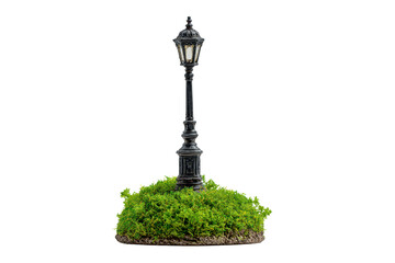 Naklejka premium Decorative street lamp miniature on a small grass base with charming details, compact post, and whimsical diorama feel isolated on transparent background. 