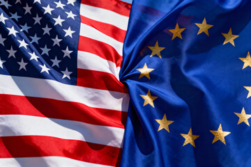The flag of the EU and the flag of the USA. Geopolitics.