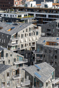 Architecture urban housing residential rooftops density pattern modern Oslo Bispevika aerial view of compact apartment blocks in daylight