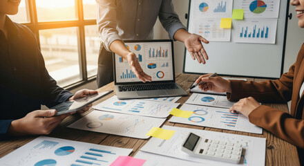 Business Team Analyzing Financial Data in Modern Office