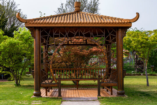 Traditional Wooden Garden Pavilion in Green Park Setting