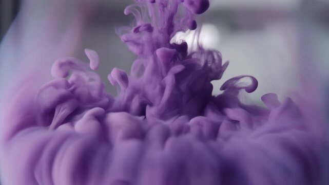 Abstract purple ink cloud swirling underwater dynamic fluid motion ethereal smoke bloom delicate diffusion liquid art