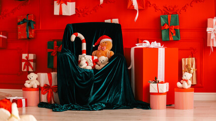 Cozy Christmas scene with plush toys and gifts arranged around a velvet armchair