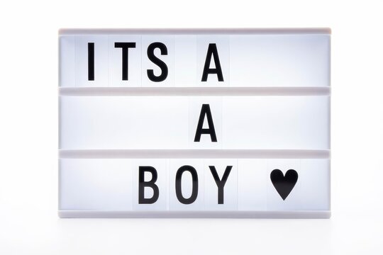 Its a boy text in a light box. Box isolated over white background. A sign with a message.