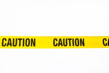 Yellow plastic &ldquo;Caution&rdquo; tape isolated on white background.