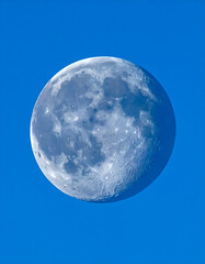 Bright Moon in Daylight Blue Sky - Astronomy and Space Photography

