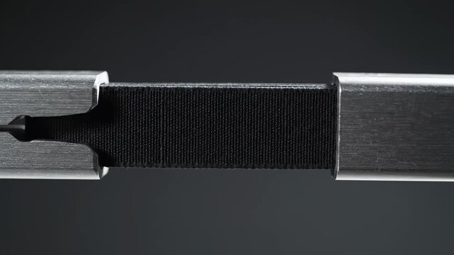 Closeup of metal and fabric strap