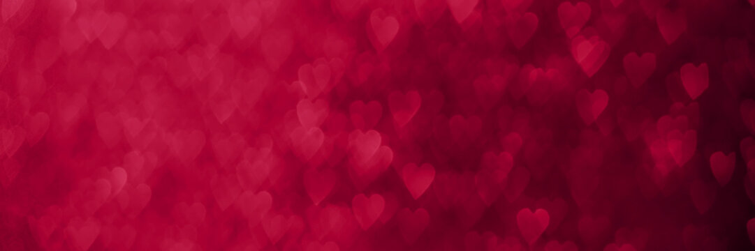 Magenta, pink hearts banner, sparkling glitter bokeh background header, valentines day abstract defocused texture.