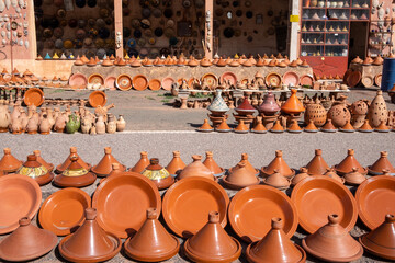 Tajine moroccan pottery for sale in a shop on the road to Marrakesh.  Morocco, North Africa
