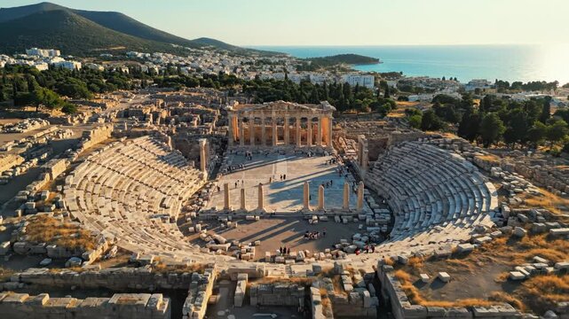Ancient ruins with columns and visitors