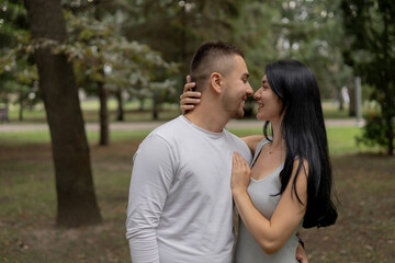 Obraz premium A young couple in love hugging each other in love and tenderness.
