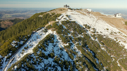 Chiemgau mountain valley landscape close to the Hochfelln peak during winter and autumn season
