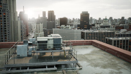 A rooftop scene captures the beauty of a city skyline at golden hour. Buildings stretch towards the sky while the sun sets behind the horizon, casting a warm glow over the urban landscape.