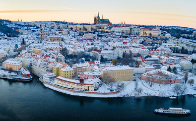 Fototapeta premium High Resolution Panorama Picture of Winter Snowy Prague Old Town with Prague Castle during Sunset , Czech republic