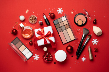Christmas cosmetic, make-up products with holiday decorations.