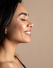 Radiant Beauty - A Close-Up Portrait of a Smiling Woman with Glowing Skin.