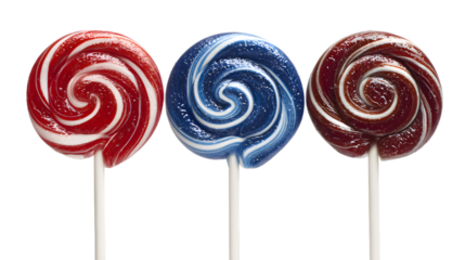 Three colorful lollipops on sticks isolated on a transparent background