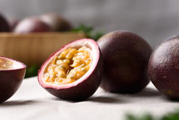 Passion fruit from local market on gray background, Tropical fruit in spring and summer season
