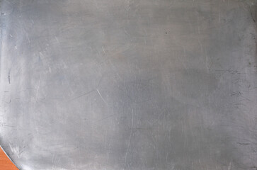 Aluminum metal texture. Scratches and surface imperfections. Cold tone. Copy space.