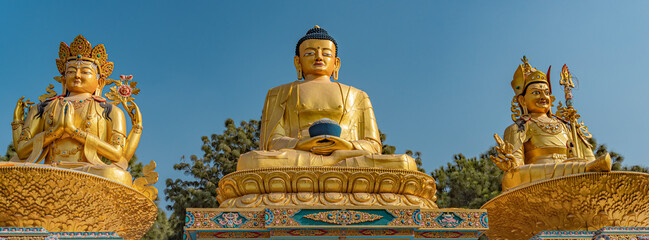 Buddha Park and three Buddha statues in Kathmandu, Nepal.