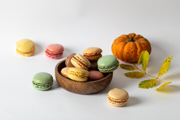 Multicolored macaroons on a light background