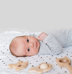 Portrait of 2 weeks old baby. Newborn baby at first months of life.