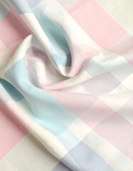 Pastel Plaid Fabric - Soft Hues and Gentle Folds.