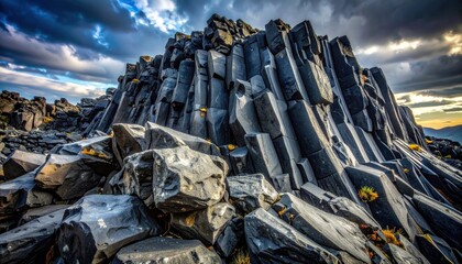 Dramatic basalt columns under a cloudy sky, natural landscape.